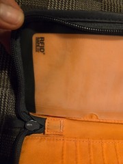 Pacsafe® RFIDsafe™ RFID blocking compact travel organizer, gray (orange inside)