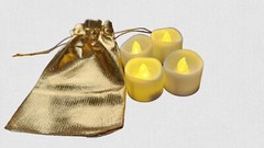 Set of 4 tea lights in beautiful bag. Great for hotels, camping, child room